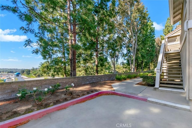 56 Coventry Ln Unit 293, Aliso Viejo, CA 92656 - fenced backyard featuring stairs and a patio