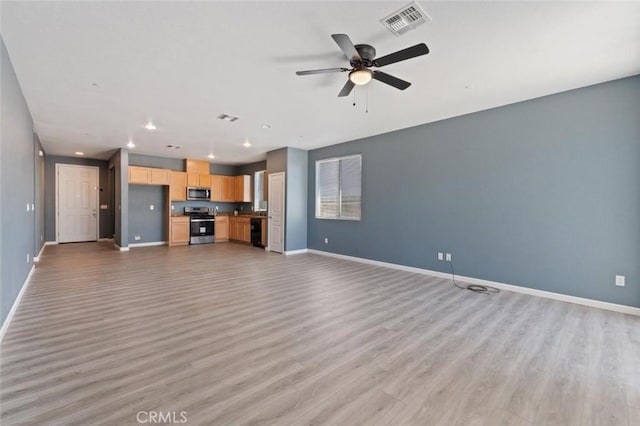 1171 S Filbert Ave, Fresno, CA 93727 - unfurnished living room with light wood finished floors, baseboards, a ceiling fan, and recessed lighting