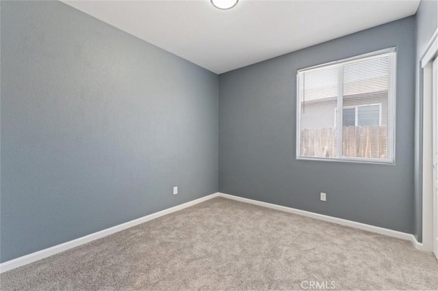 1171 S Filbert Ave, Fresno, CA 93727 - empty room with carpet flooring and baseboards