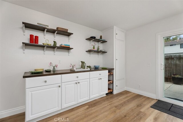 24462 Copper Cliff Ct Unit 20, Lake Forest, CA 92630 - bar with light wood-style flooring and baseboards