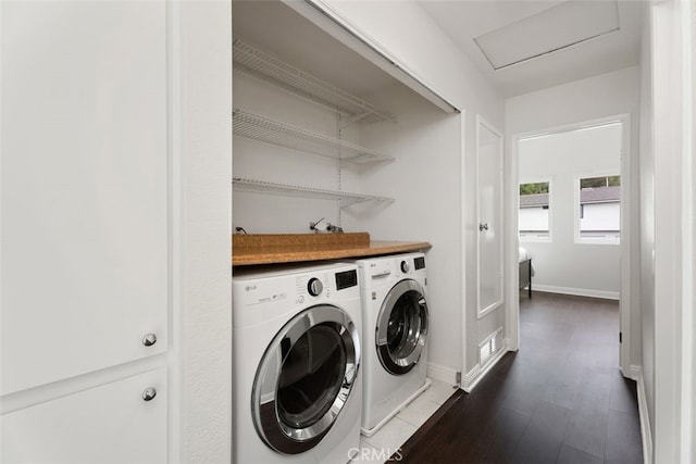 24462 Copper Cliff Ct Unit 20, Lake Forest, CA 92630 - laundry room featuring dark wood-style flooring, baseboards, independent washer and dryer, and attic access