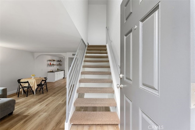 24462 Copper Cliff Ct Unit 20, Lake Forest, CA 92630 - staircase featuring wood finished floors and baseboards