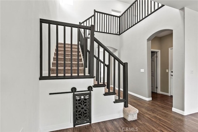 367 Lily Pad Ln, Templeton, CA 93465 - stairs with arched walkways, wood finished floors, and a towering ceiling