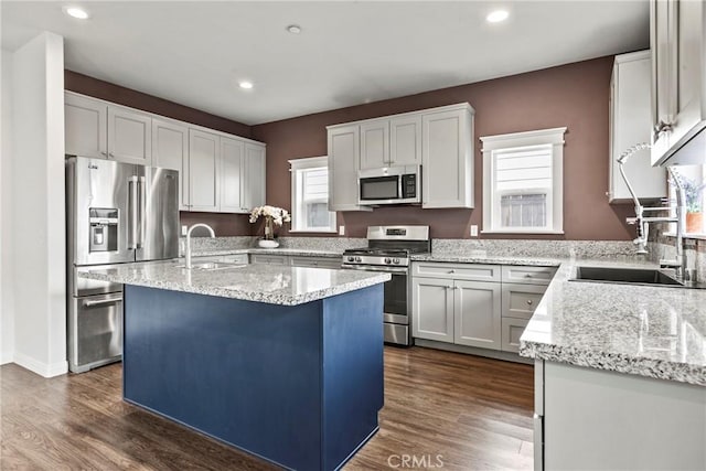 367 Lily Pad Ln, Templeton, CA 93465 - kitchen with stainless steel appliances, healthy amount of natural light, a kitchen island, light stone countertops, and recessed lighting