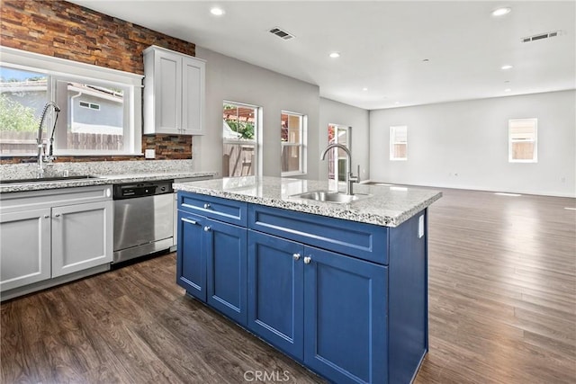 367 Lily Pad Ln, Templeton, CA 93465 - kitchen with stainless steel dishwasher, blue cabinets, dark wood-type flooring, an island with sink, and recessed lighting