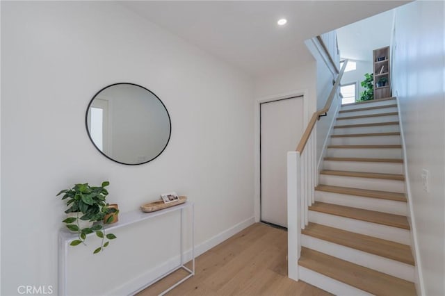1709 Wollacott St, Redondo Beach, CA 90278 - staircase featuring wood finished floors, recessed lighting, and baseboards