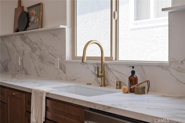 1709 Wollacott St, Redondo Beach, CA 90278 - kitchen view of a sink, backsplash, and light stone countertops