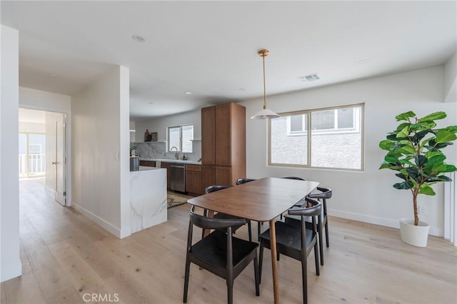 1709 Wollacott St, Redondo Beach, CA 90278 - dining room with light wood finished floors, baseboards, and recessed lighting