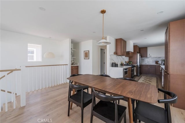 1709 Wollacott St, Redondo Beach, CA 90278 - dining area with light wood-style flooring