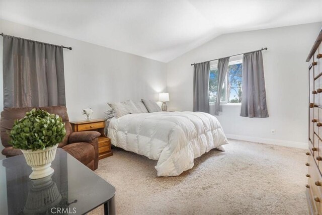 11025 Shaw St, Rancho Cucamonga, CA 91701 - carpeted bedroom with lofted ceiling and baseboards