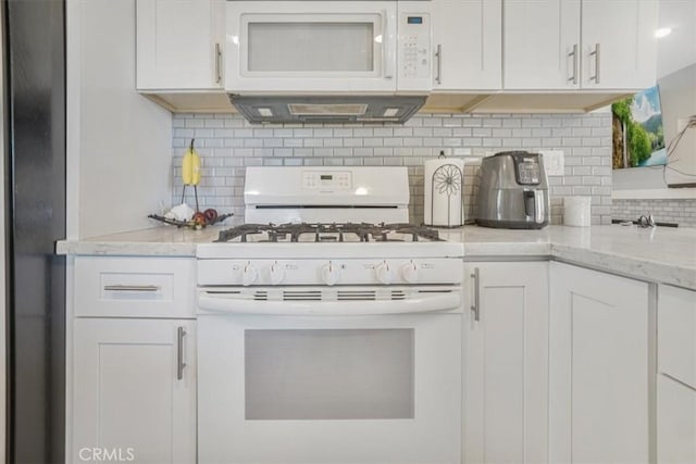 11025 Shaw St, Rancho Cucamonga, CA 91701 - kitchen with white appliances, backsplash, white cabinets, and light stone countertops