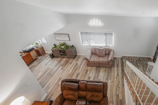11025 Shaw St, Rancho Cucamonga, CA 91701 - living area with wood finished floors and vaulted ceiling