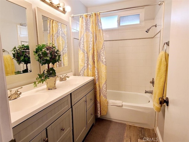 11025 Shaw St, Rancho Cucamonga, CA 91701 - full bath featuring shower / bathtub combination with curtain, wood finished floors, and double vanity