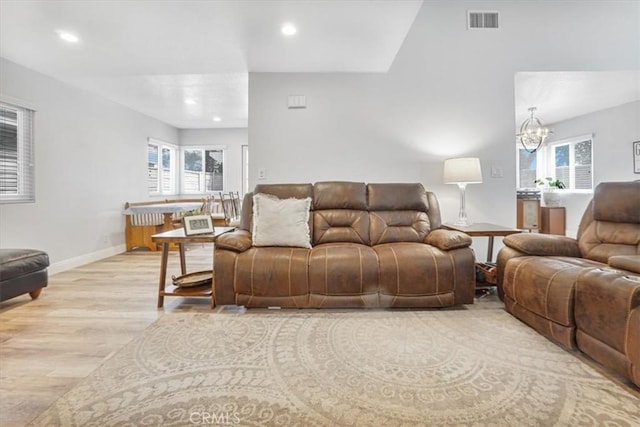 11025 Shaw St, Rancho Cucamonga, CA 91701 - living area with light wood finished floors, recessed lighting, plenty of natural light, and a chandelier