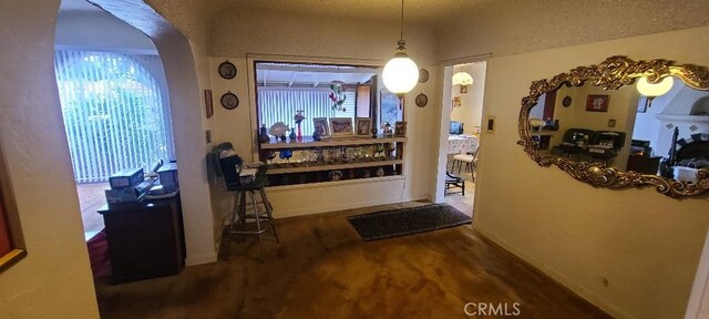 7819 Dalton Ave, Los Angeles, CA 90047 - hall with arched walkways and baseboards