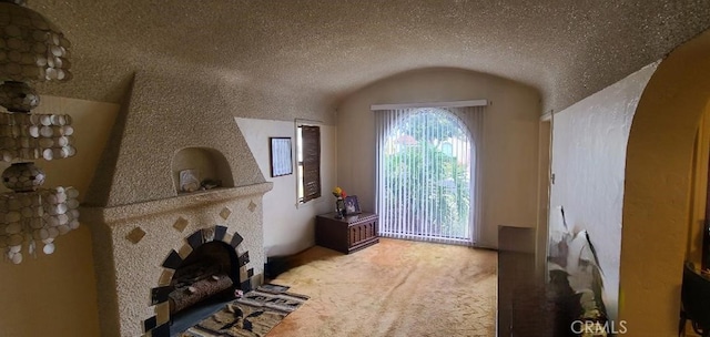 7819 Dalton Ave, Los Angeles, CA 90047 - foyer with carpet flooring, vaulted ceiling, and arched walkways