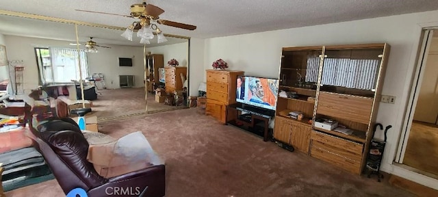 7819 Dalton Ave, Los Angeles, CA 90047 - living room featuring carpet floors, a ceiling fan, and a textured ceiling