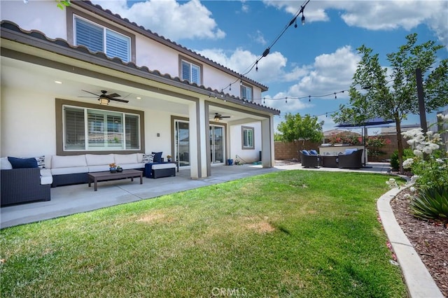 34197 Helenium St, Murrieta, CA 92563 - rear view of house featuring a ceiling fan, outdoor lounge area, a patio, stucco siding, and a hot tub