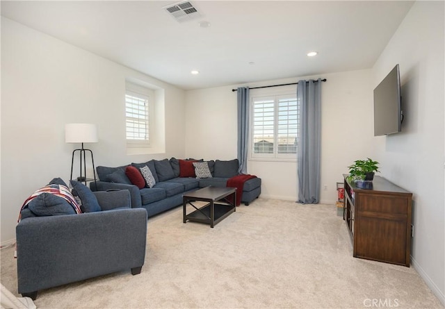 34197 Helenium St, Murrieta, CA 92563 - living area featuring plenty of natural light, light carpet, baseboards, and recessed lighting