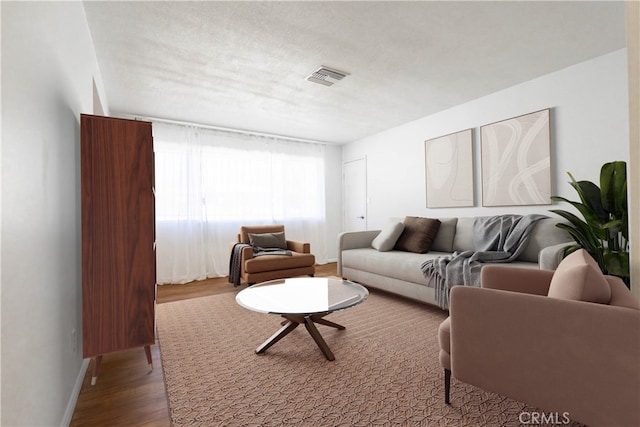 66691 Flora Ave, Desert Hot Springs, CA 92240 - living area featuring wood finished floors and baseboards