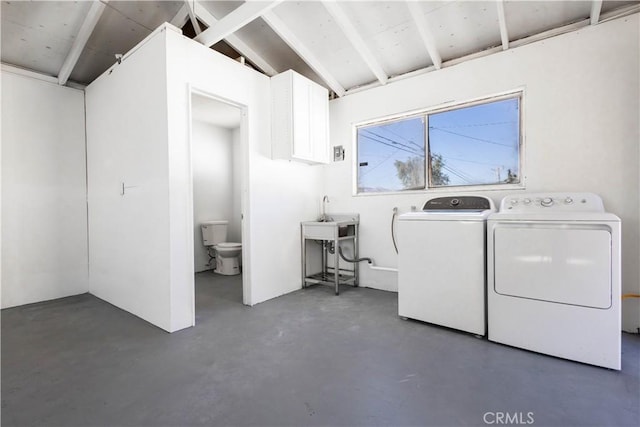 66691 Flora Ave, Desert Hot Springs, CA 92240 - laundry area featuring washing machine and dryer