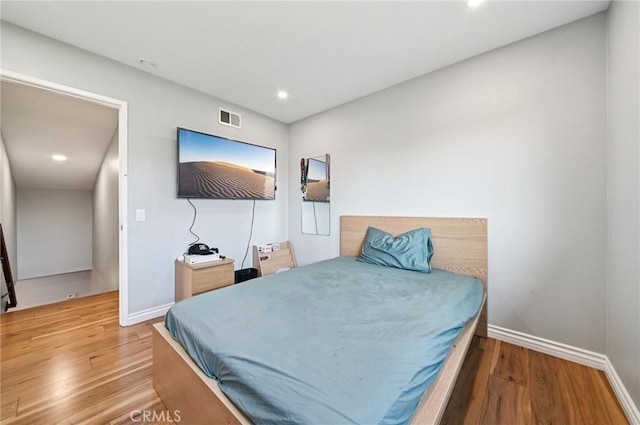 9256 Crocus Ave, Fountain Valley, CA 92708 - bedroom with wood finished floors and recessed lighting