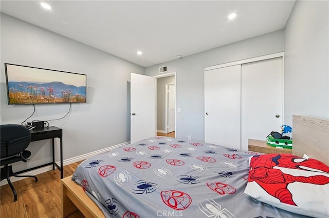 9256 Crocus Ave, Fountain Valley, CA 92708 - bedroom with wood finished floors, a closet, and recessed lighting