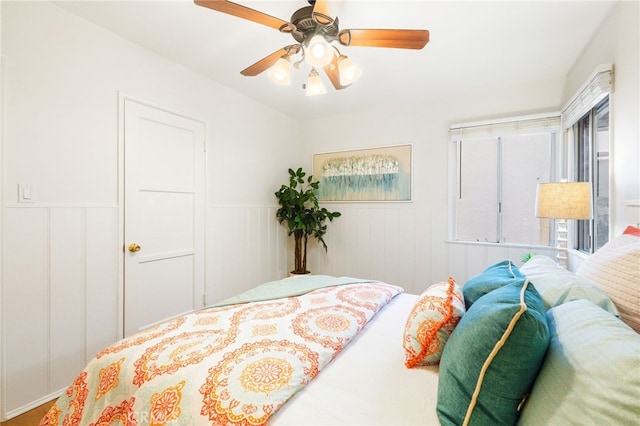 1357 Curtis Ave, Manhattan Beach, CA 90266 - bedroom with a wainscoted wall, ceiling fan, and a decorative wall
