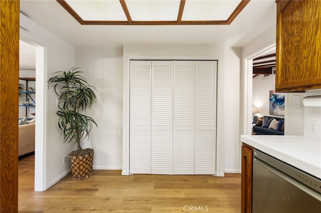 1357 Curtis Ave, Manhattan Beach, CA 90266 - kitchen featuring dishwasher, light wood-style floors, light countertops, and baseboards