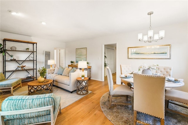 1357 Curtis Ave, Manhattan Beach, CA 90266 - living room featuring a chandelier and light wood-style floors