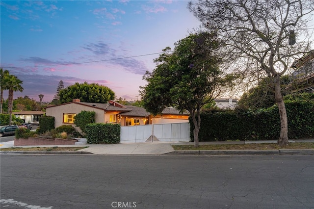 1357 Curtis Ave, Manhattan Beach, CA 90266 - view of front of property featuring driveway, a chimney, and stucco siding