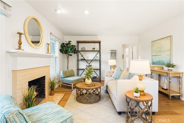 1357 Curtis Ave, Manhattan Beach, CA 90266 - living room featuring wood finished floors, a brick fireplace, and recessed lighting