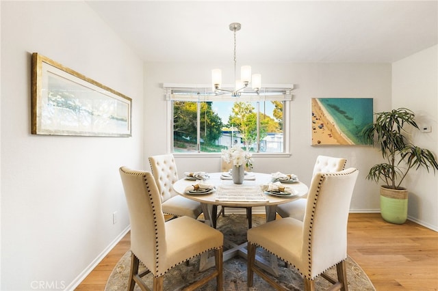 1357 Curtis Ave, Manhattan Beach, CA 90266 - dining room featuring a chandelier, light wood-style floors, and baseboards