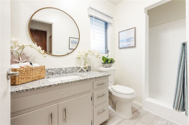 1357 Curtis Ave, Manhattan Beach, CA 90266 - bathroom with toilet, vanity, and a shower