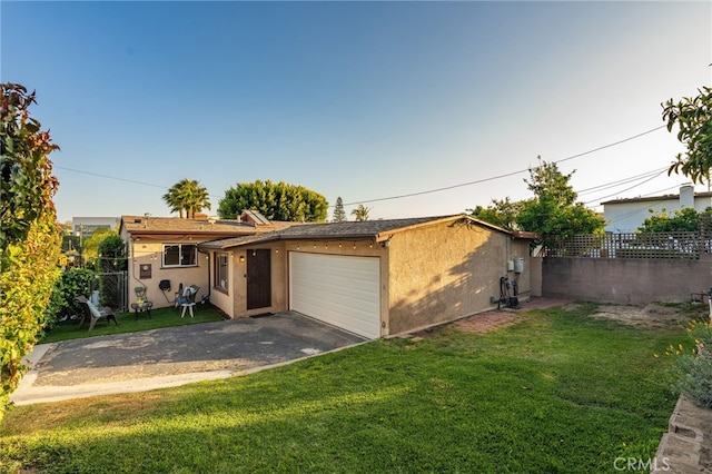 1357 Curtis Ave, Manhattan Beach, CA 90266 - view of front of property with stucco siding, an attached garage, and asphalt driveway