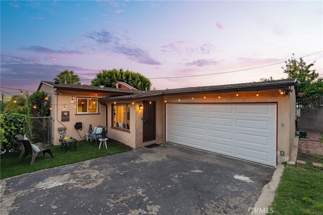 1357 Curtis Ave, Manhattan Beach, CA 90266 - view of front of property with asphalt driveway, stucco siding, and an attached garage