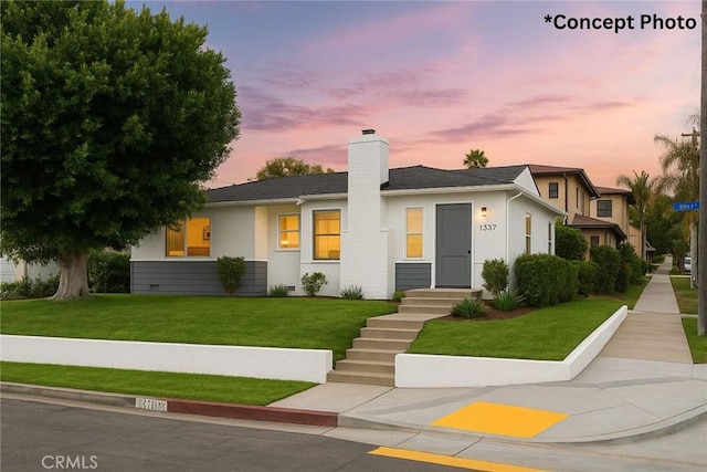 1357 Curtis Ave, Manhattan Beach, CA 90266 - view of front of house with a front lawn, a chimney, and stucco siding