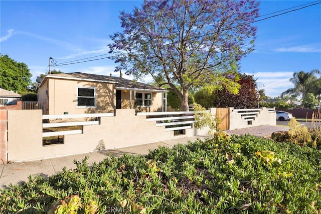 14124 Sayre St, Sylmar, CA 91342 - rear view of house featuring stucco siding