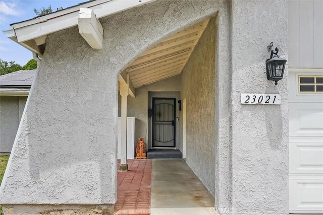 23021 Posada Dr, Valencia, CA 91354 - property entrance featuring stucco siding