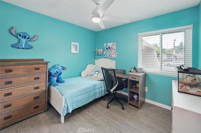 23021 Posada Dr, Valencia, CA 91354 - bedroom featuring light wood-style floors, a ceiling fan, and baseboards