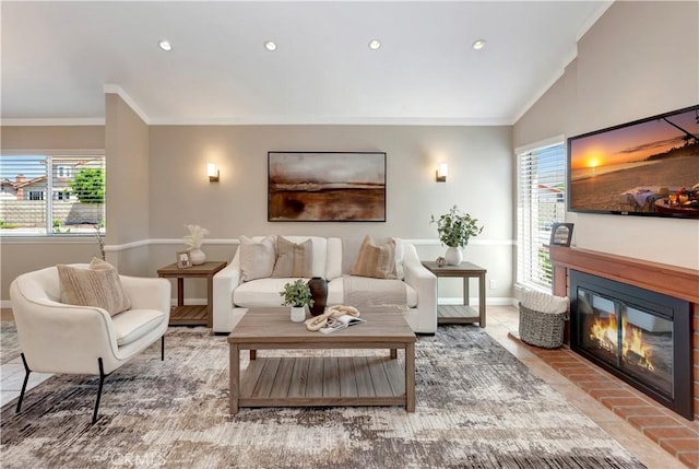 3531 Almond St, Irvine, CA 92606 - living area with crown molding, baseboards, a glass covered fireplace, recessed lighting, and lofted ceiling