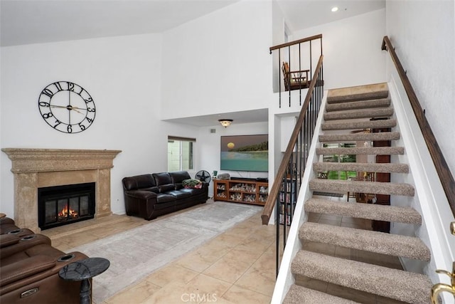 2922 Estancia, San Clemente, CA 92673 - staircase with a high end fireplace and a high ceiling