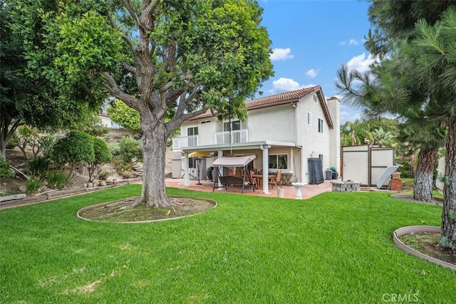 2922 Estancia, San Clemente, CA 92673 - rear view of house with a patio area, a balcony, a yard, and stucco siding
