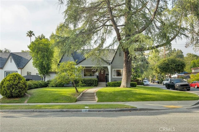2309 E Glenoaks Blvd, Glendale, CA 91206 - view of property hidden behind natural elements featuring a front yard and stucco siding
