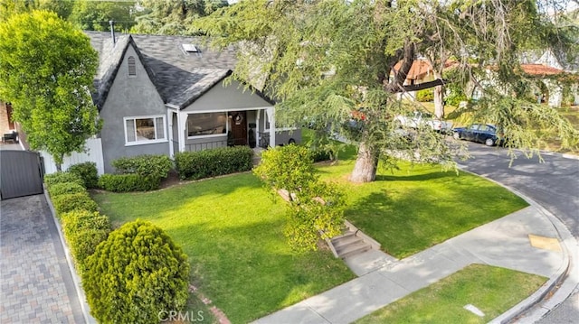 2309 E Glenoaks Blvd, Glendale, CA 91206 - view of front of house featuring stucco siding, a shingled roof, and covered porch