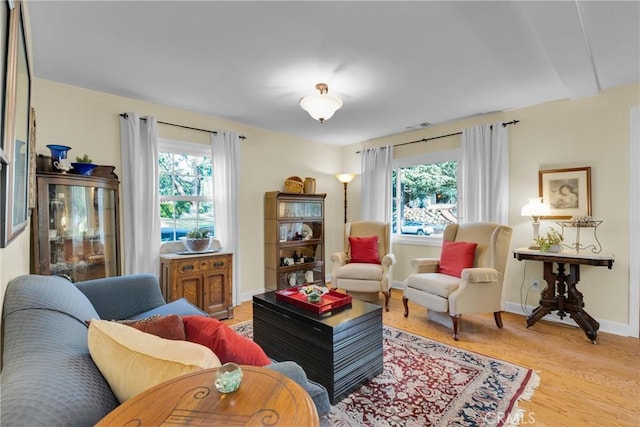 2309 E Glenoaks Blvd, Glendale, CA 91206 - living room featuring healthy amount of natural light, light wood-style floors, and baseboards
