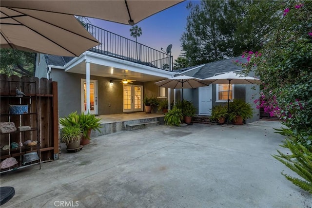 2309 E Glenoaks Blvd, Glendale, CA 91206 - patio terrace at dusk with french doors, a balcony, and a patio
