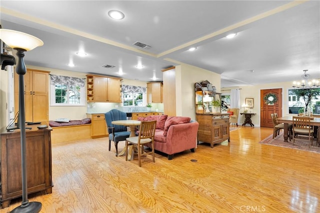 2309 E Glenoaks Blvd, Glendale, CA 91206 - living area with light wood-type flooring, recessed lighting, and a chandelier