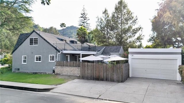 2309 E Glenoaks Blvd, Glendale, CA 91206 - view of front of home featuring stucco siding, driveway, and a mountain view