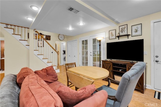 2309 E Glenoaks Blvd, Glendale, CA 91206 - living room featuring stairs, french doors, wood finished floors, washer / dryer, and recessed lighting